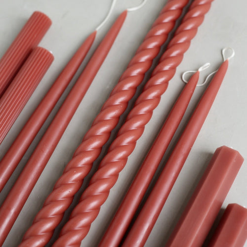 Our Clay Taper Set combines all of our clay-hued taper candles into the perfect bundle. Display the sizes and shapes together or separately.   Set includes: one pair of moss 12" and one pair of moss 18" dipped taper candles. One pair of 18", one pair of 10" and one pair of 6" Fancy Taper Candles. 