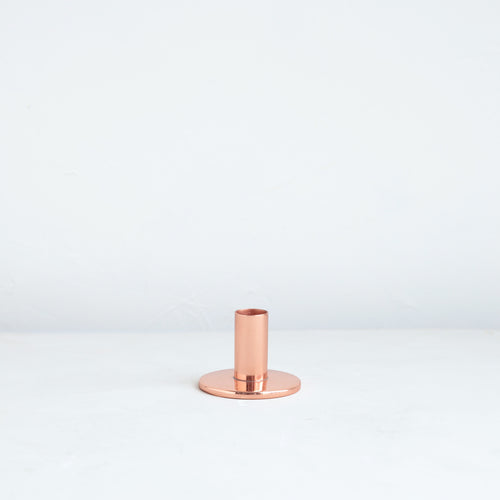 The perfect companion to our taper candle collection, our copper taper holders are a sleek, modern way to add a lustrous accent to any space. Each copper plated holder is sized to fit a standard taper candle.