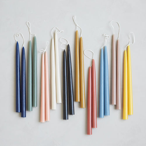 Dipped taper candles for dining room table decor. Colors are inspired by natural hues