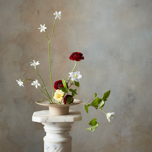 Our handcrafted Copper Flower Frogs are an aesthetically considered take on a utilitarian design mechanic. Used to space stems out and hold them in place, they pair perfectly with our Ceramic Cylinder Vase and the Ikebana Vase. Pure copper, they will patina gracefully over time.