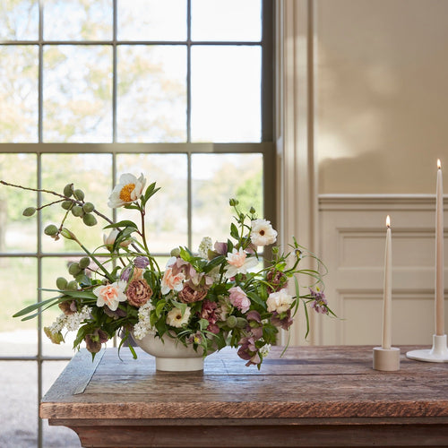 White ceramic compote vase. compote vase floral arrangement. 