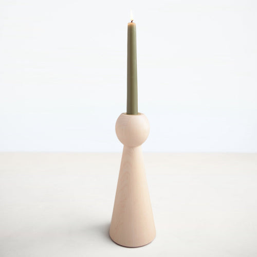 The Bella Candle Holder is hand turned in Lostine's small wood shop in Pennsylvania. This approachable, modern design is created with maple wood.  Each candle holder has a brass insert and pairs perfectly with our taper candles. Made in USA.