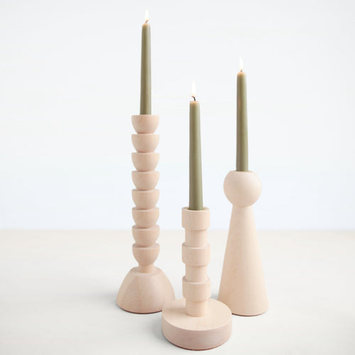 The Bella Candle Holder is hand turned in Lostine's small wood shop in Pennsylvania. This approachable, modern design is created with maple wood.  Each candle holder has a brass insert and pairs perfectly with our taper candles. Made in USA.