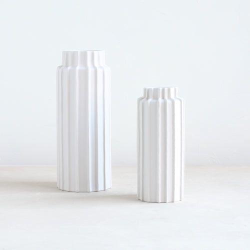 Our ceramic cylinder vases invite you to reconnect with the wild bounty of nature, providing the perfect vessels for a foraged handful or a farmer’s market bunch. Inspired by organic linear forms found in nature, use them for impromptu and loose arrangements or for displaying dried botanicals through the colder months.