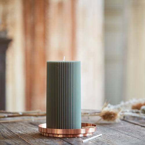 Our 3x6 ribbed pillar is a modern take on a traditional candle and embodies a superior depth of color, a cotton wick, and a 70-hour burn time.  Subtle variations in wax depth and color opacity may occur. Available in 4 custom colors: Parchment, Moss, Petal & Clay.  Dimensions: 3”W x 6”H